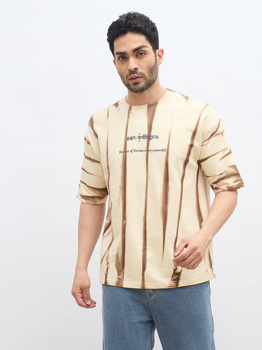 Beige Spray Print T-Shirt – "प्रबलः कर्मसिद्धान्तः" (The Law of Karma is Powerful)