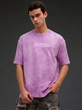 Lavender acid wash oversized T-shirt with Sanskrit quote "Antah Asti Prarambhah" by Rudrajap, casual and stylish.