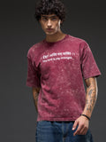 Brick red acid wash oversized T-shirt by Rudrajap with Sanskrit quote “Ishwarah Asti Mama Shaktih” in heavyweight 240 GSM cotton.