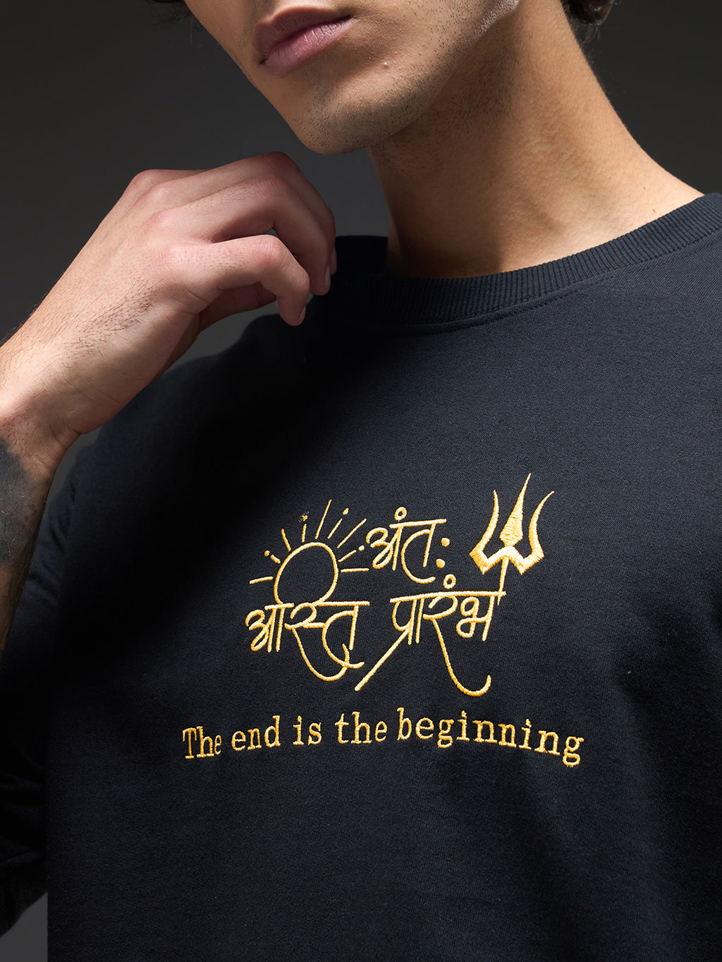 Black and mustard recycled oversized T-shirt from Rudrajap with bold graphic print, relaxed fit, and eco-friendly cotton fabric.