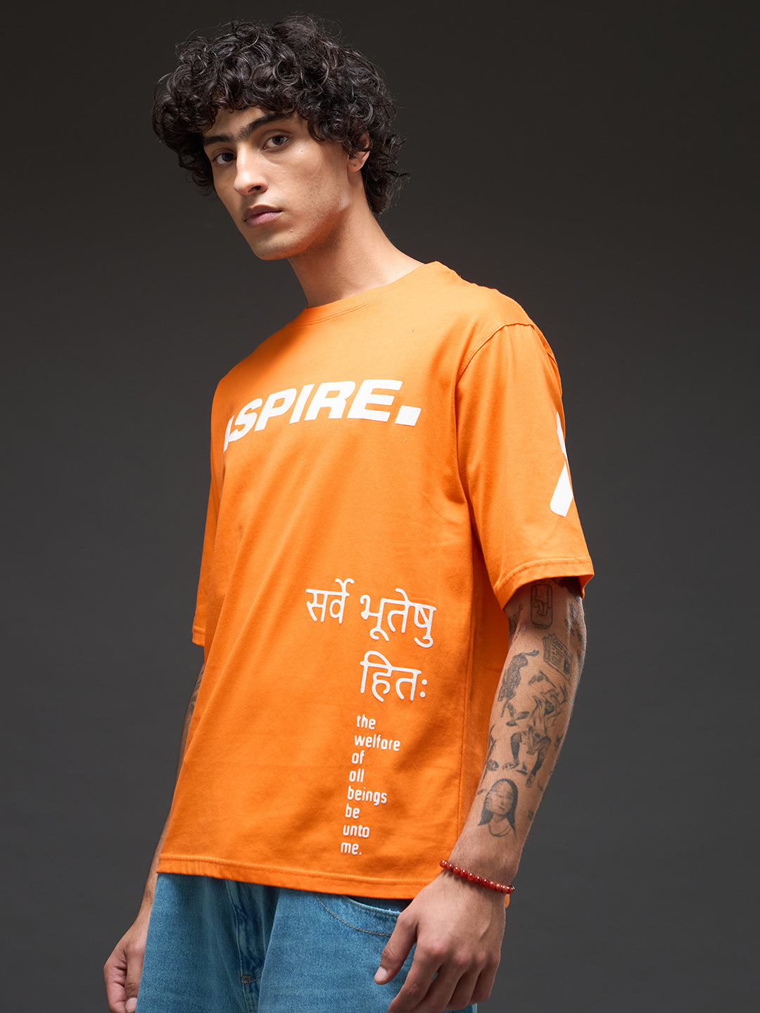 Oversized Rudrajap Purushottam T-shirt in black with bold graphic print, casual fit, and round neckline.