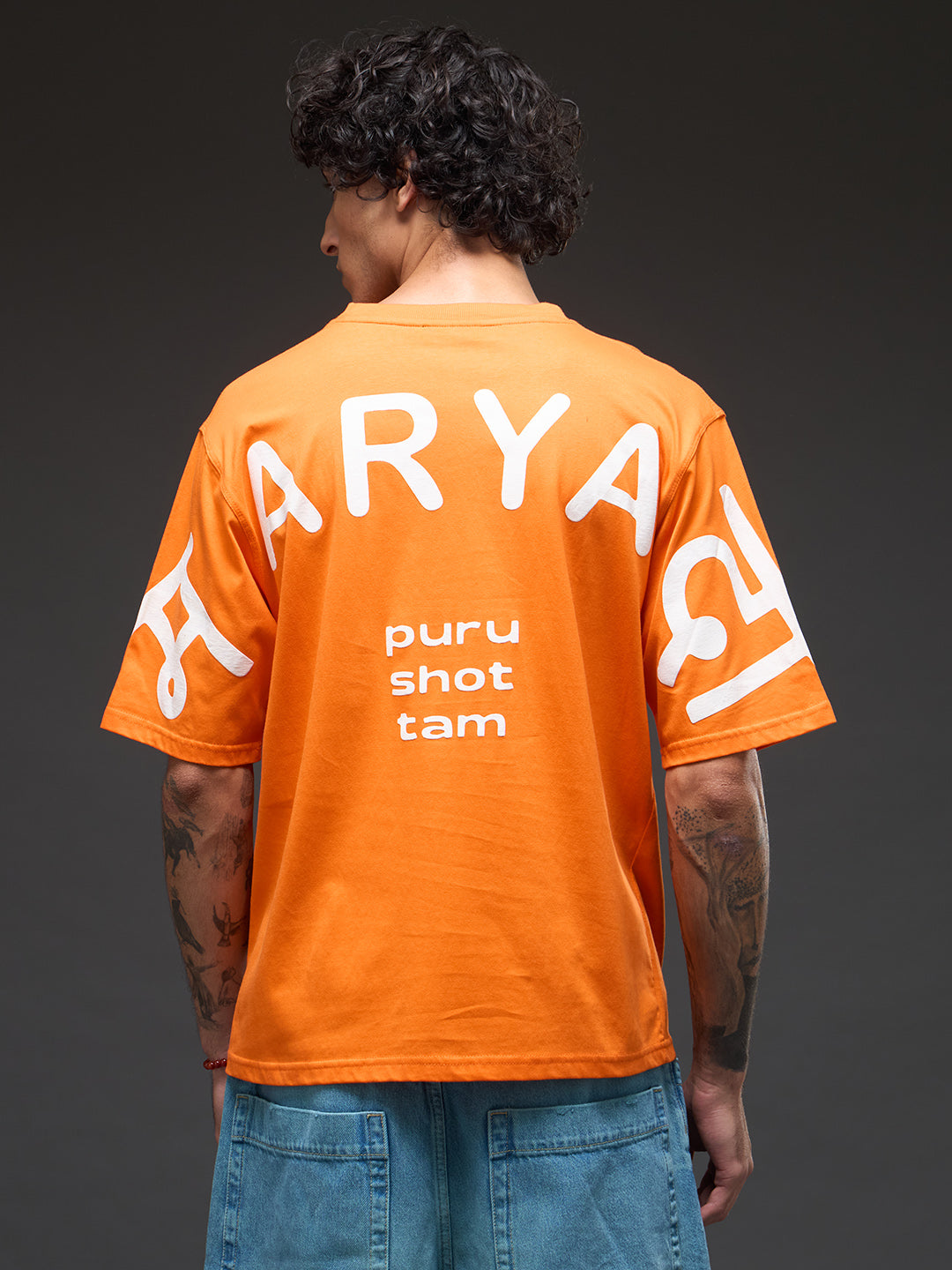 Rudrajap Purushottam oversized T-shirt in black with bold graphic design, casual fit, and short sleeves.