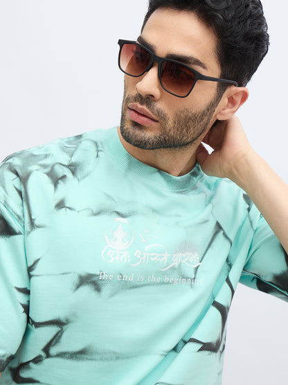 Mint Green Spray Print T-Shirt – "अंतः अस्ति प्रारंभः" (The End is the Beginning)