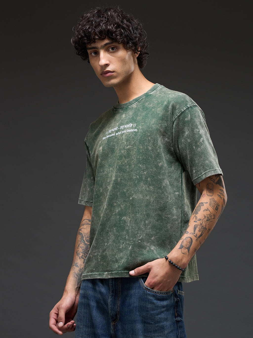 Moss green oversized burnout T-shirt by Rudrajap, featuring a relaxed fit and soft, textured fabric for casual wear.