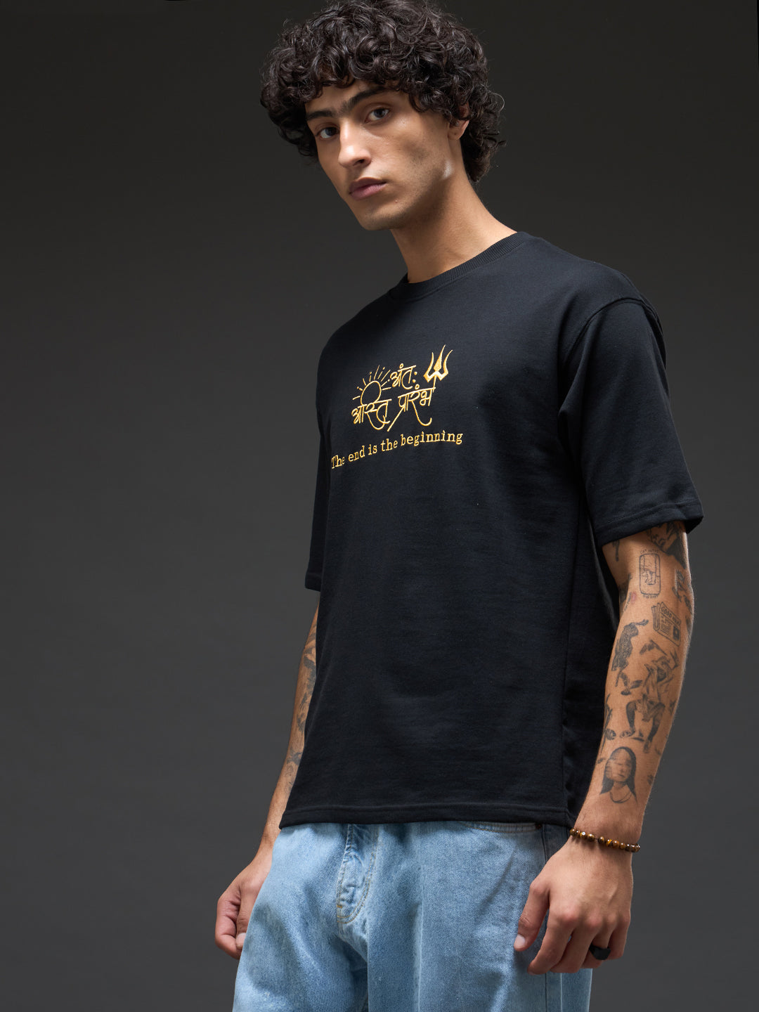 Black and mustard recycled oversized tee from Rudrajap featuring bold, relaxed fit and eco-friendly fabric.