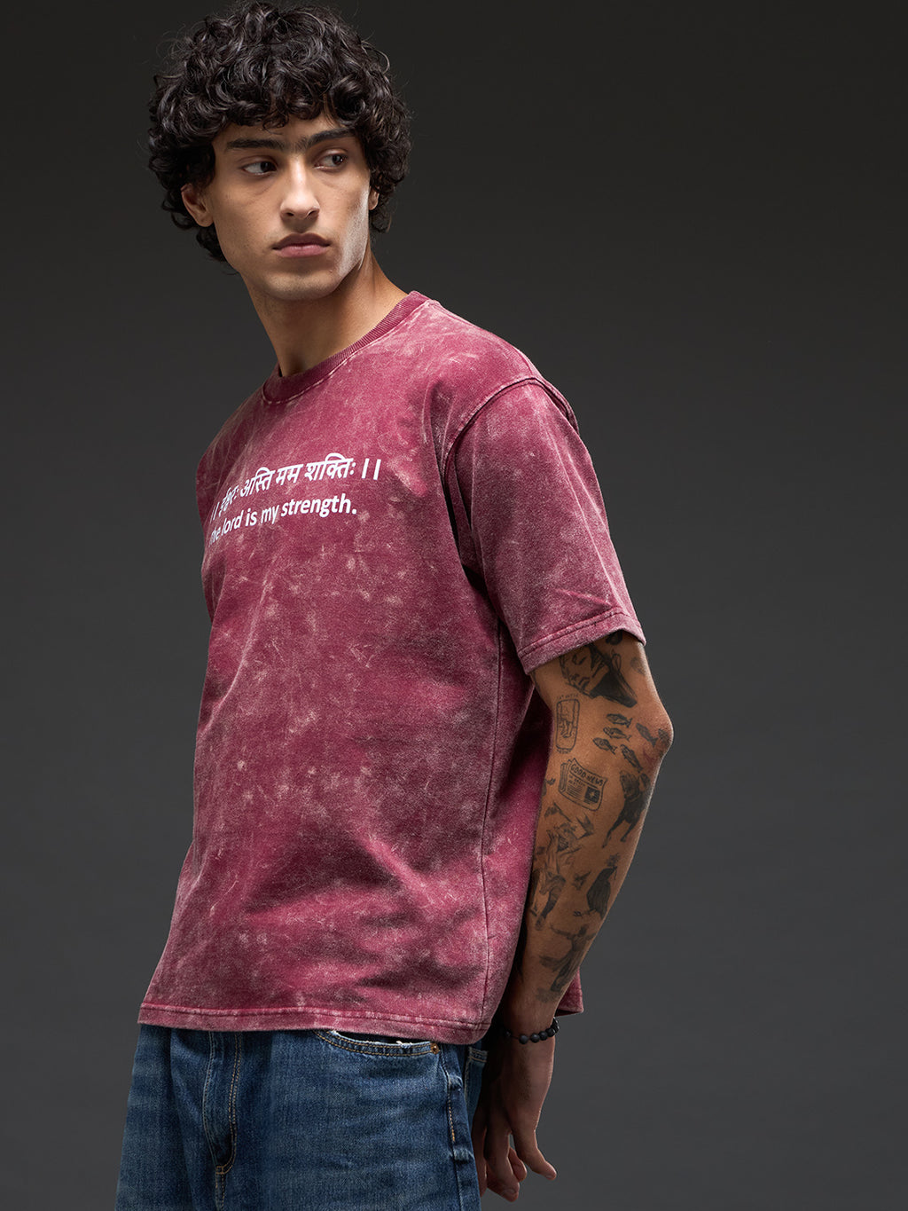 Brick red acid wash oversized T-shirt by Rudrajap with Sanskrit quote "Ishwarah Asti Mama Shaktih" in heavyweight 240 GSM cotton.
