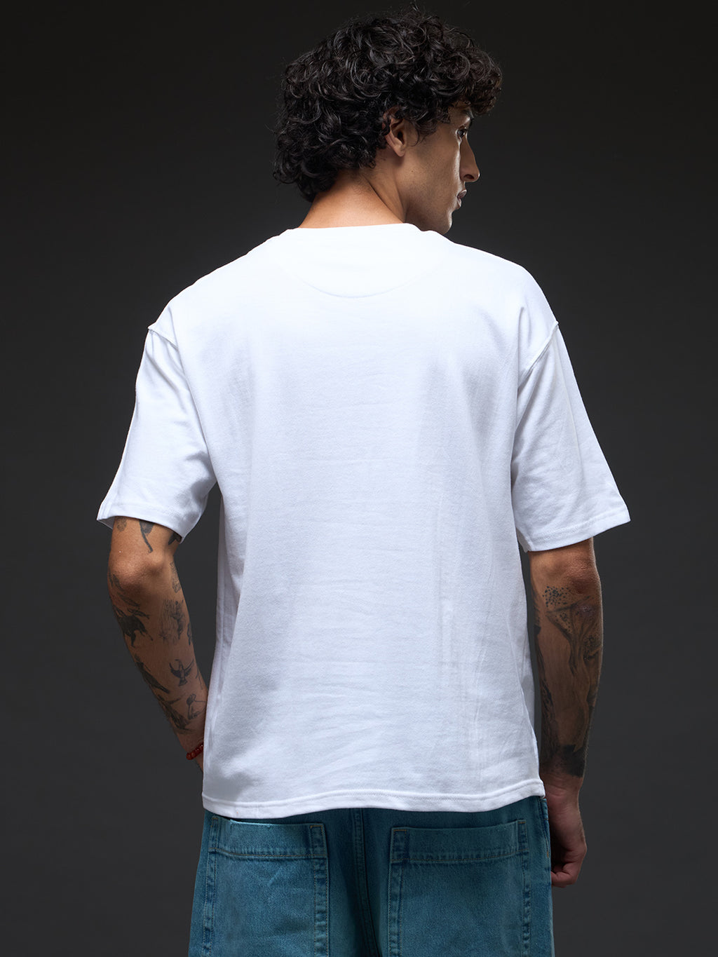 White and beige recycled oversized tee from Rudrajap featuring a relaxed fit and eco-friendly fabric.