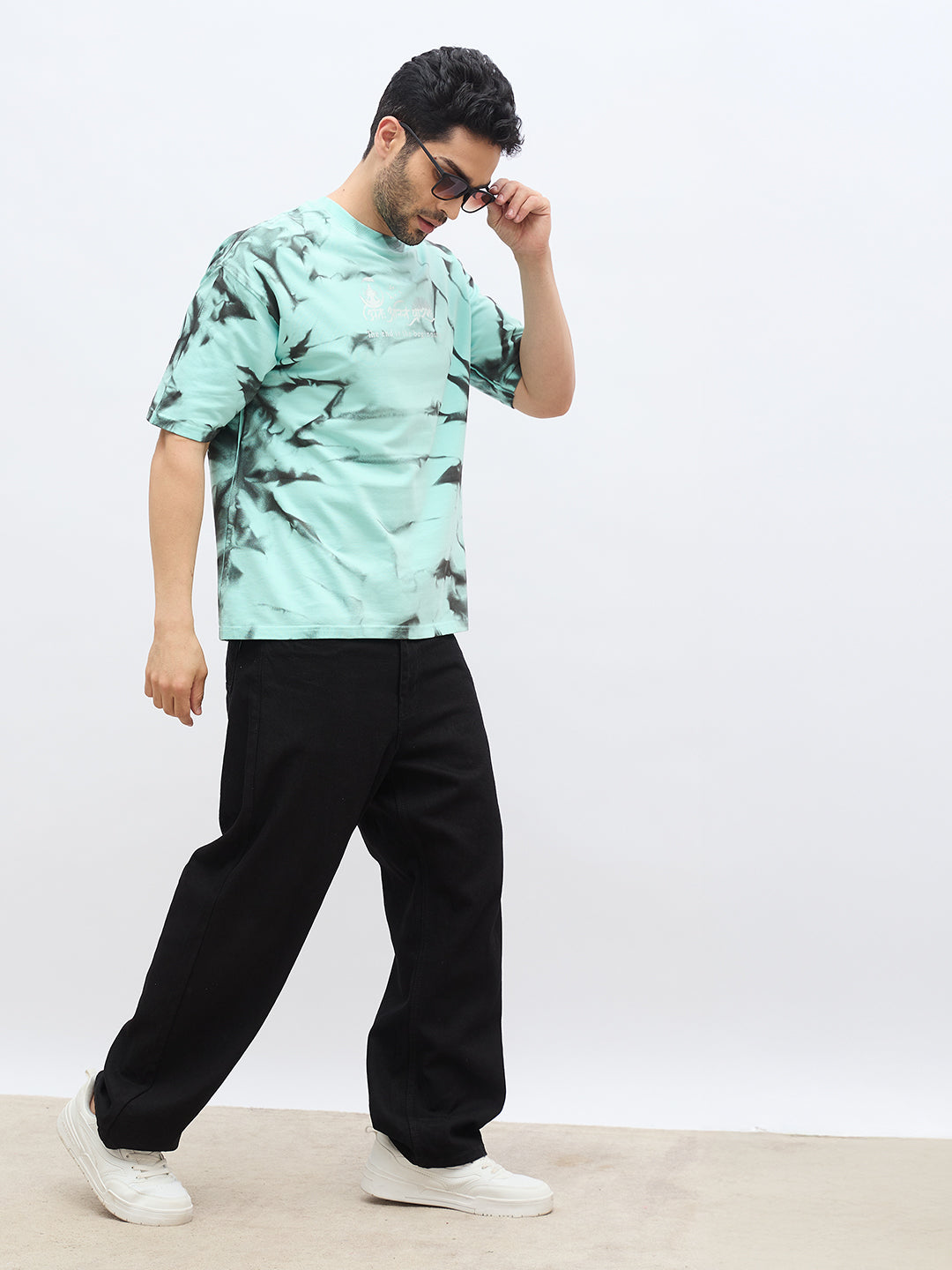 Mint Green Spray Print T-Shirt – "अंतः अस्ति प्रारंभः" (The End is the Beginning)