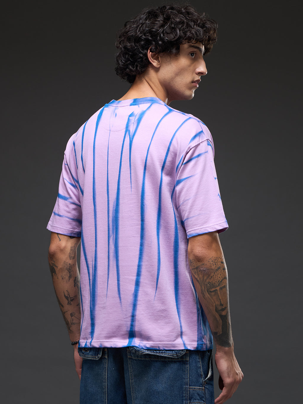 Lavender Spray and Puff Print Oversized T-shirt by Rudrajap featuring a relaxed fit and soft fabric, with lavender-themed design.