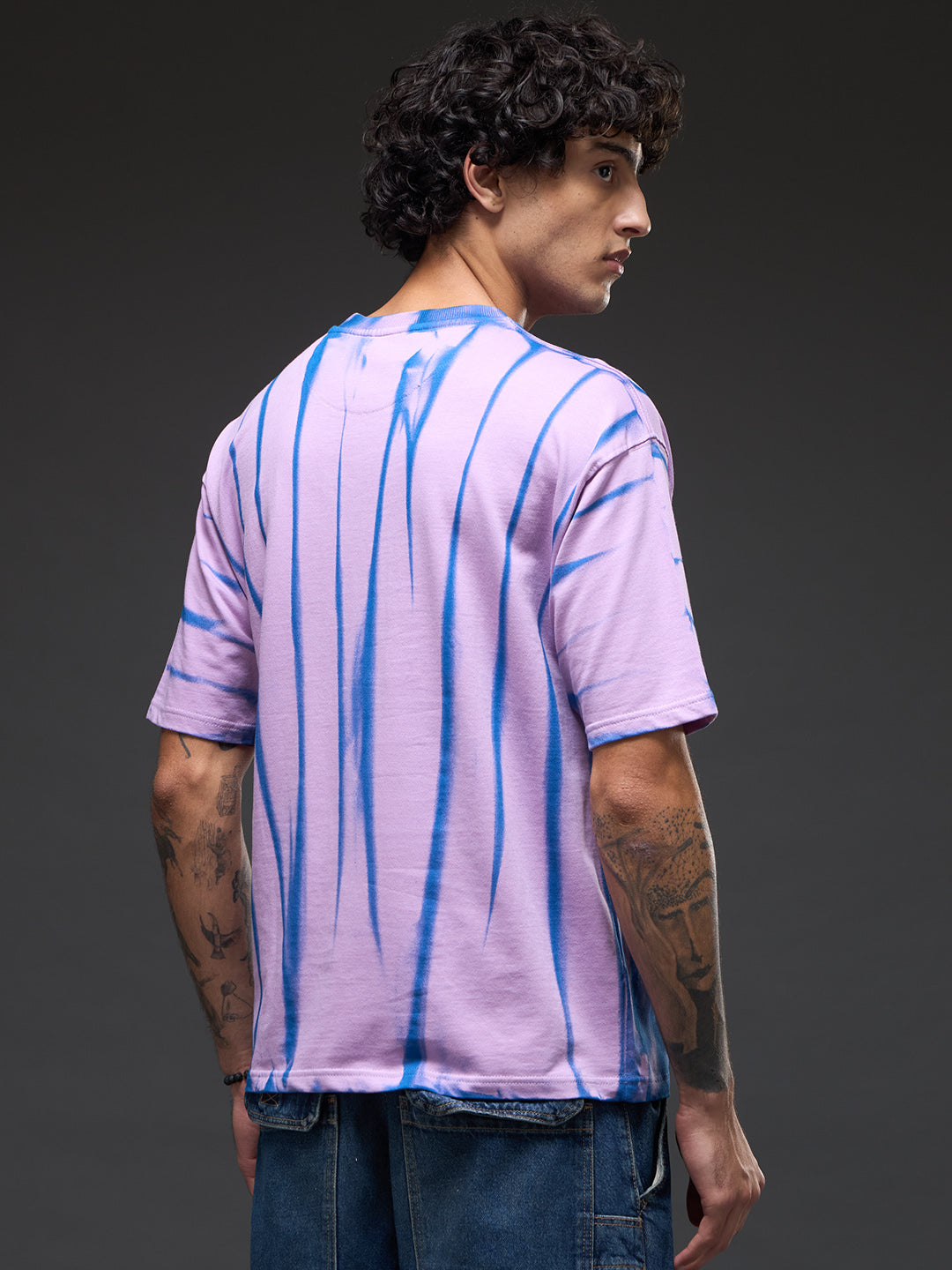Lavender Spray and Puff Print Oversized T-shirt by Rudrajap featuring a relaxed fit and soft fabric, with lavender-themed design.