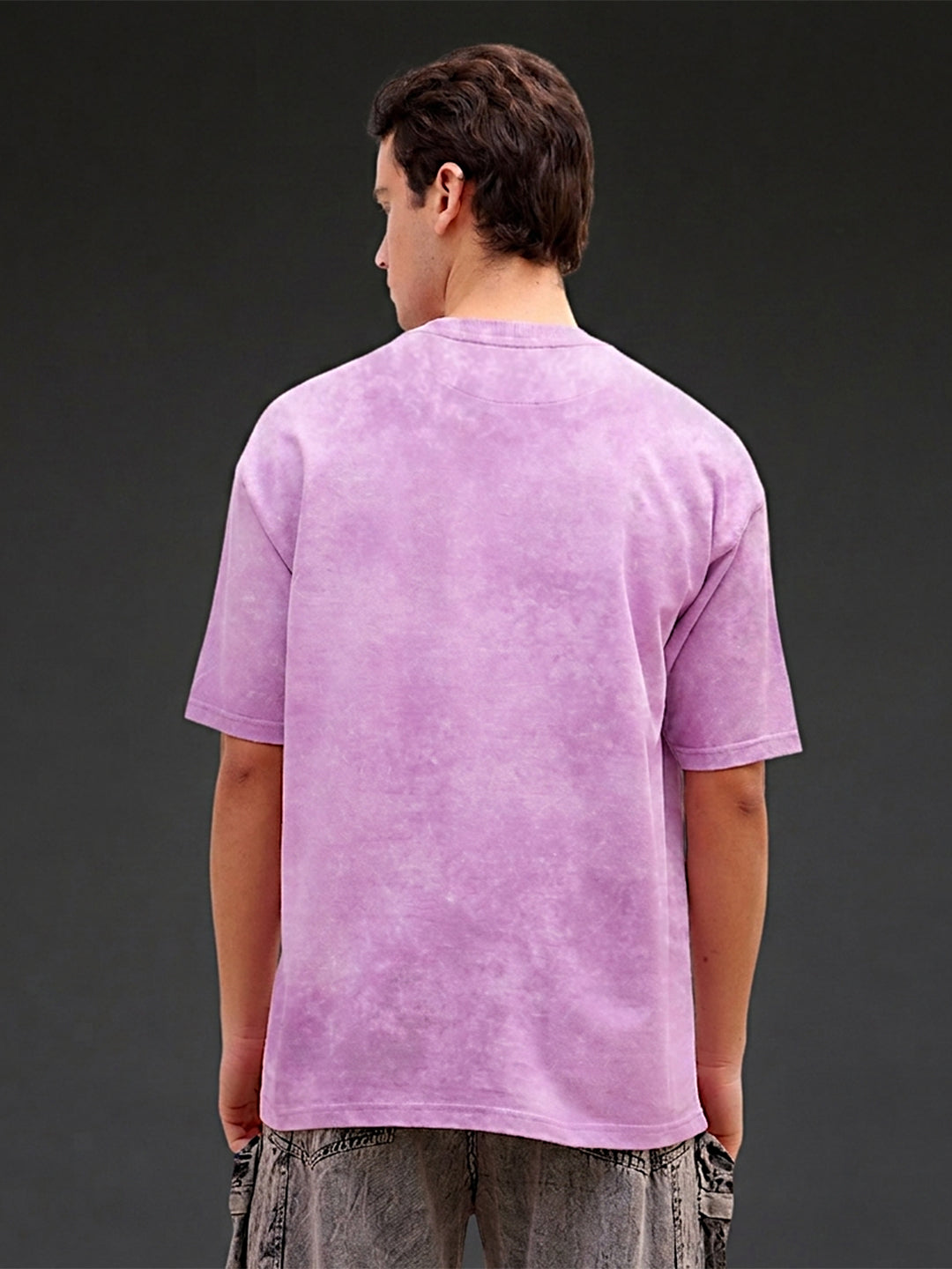 Lavender acid wash oversized T-shirt by Rudrajap with Sanskrit quote "Antah Asti Prarambhah" printed on front.