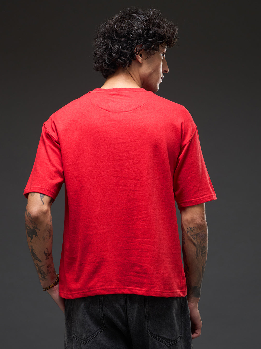 Red recycled oversized T-shirt by Rudrajap with "I Am Blessed" premium embroidery, showcasing a relaxed fit and vibrant color.