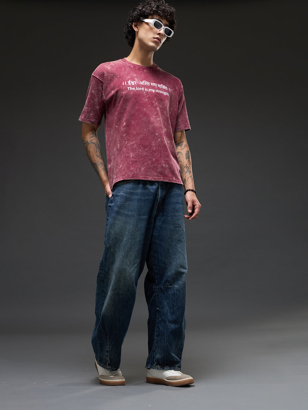 Brick red acid wash oversized T-shirt by Rudrajap with Sanskrit quote "Ishwarah Asti Mama Shaktih" in heavyweight 240 GSM cotton.