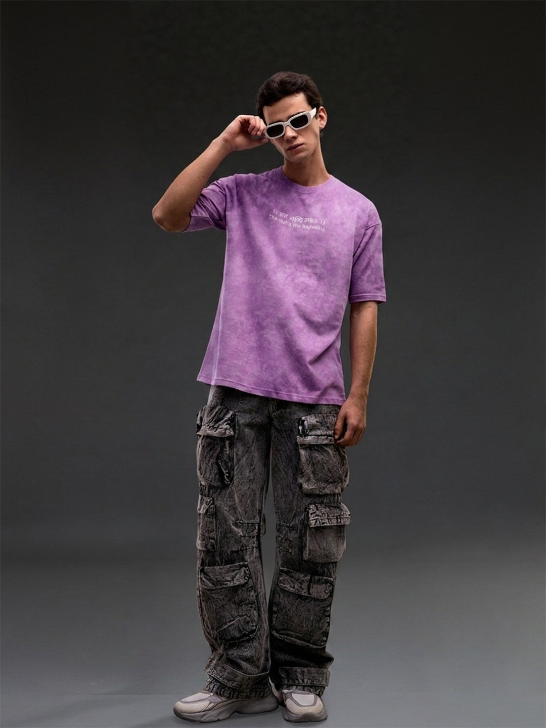 Lavender acid wash oversized T-shirt with Sanskrit quote "Antah Asti Prarambhah" by Rudrajap, casual streetwear style.