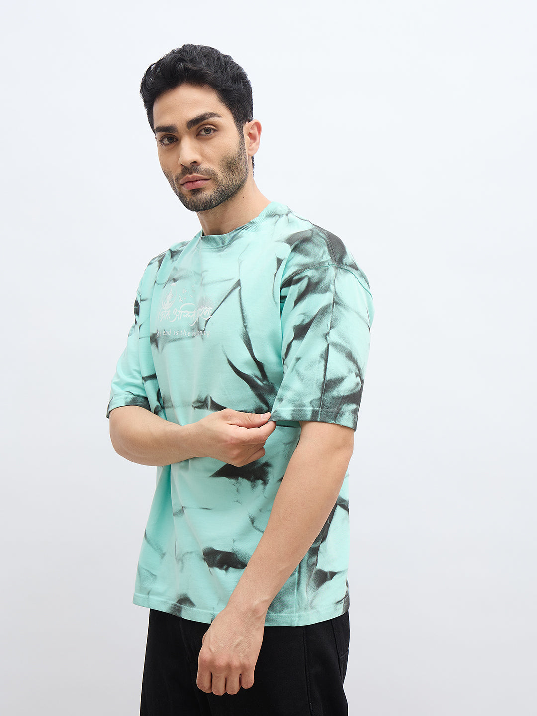 Mint Green Spray Print T-Shirt – "अंतः अस्ति प्रारंभः" (The End is the Beginning)