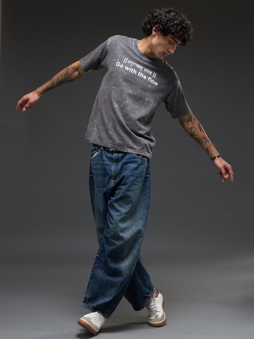 Set of three oversized Rudrajap burnout T-shirts in grey, royal blue, and black, laid flat showing front designs.