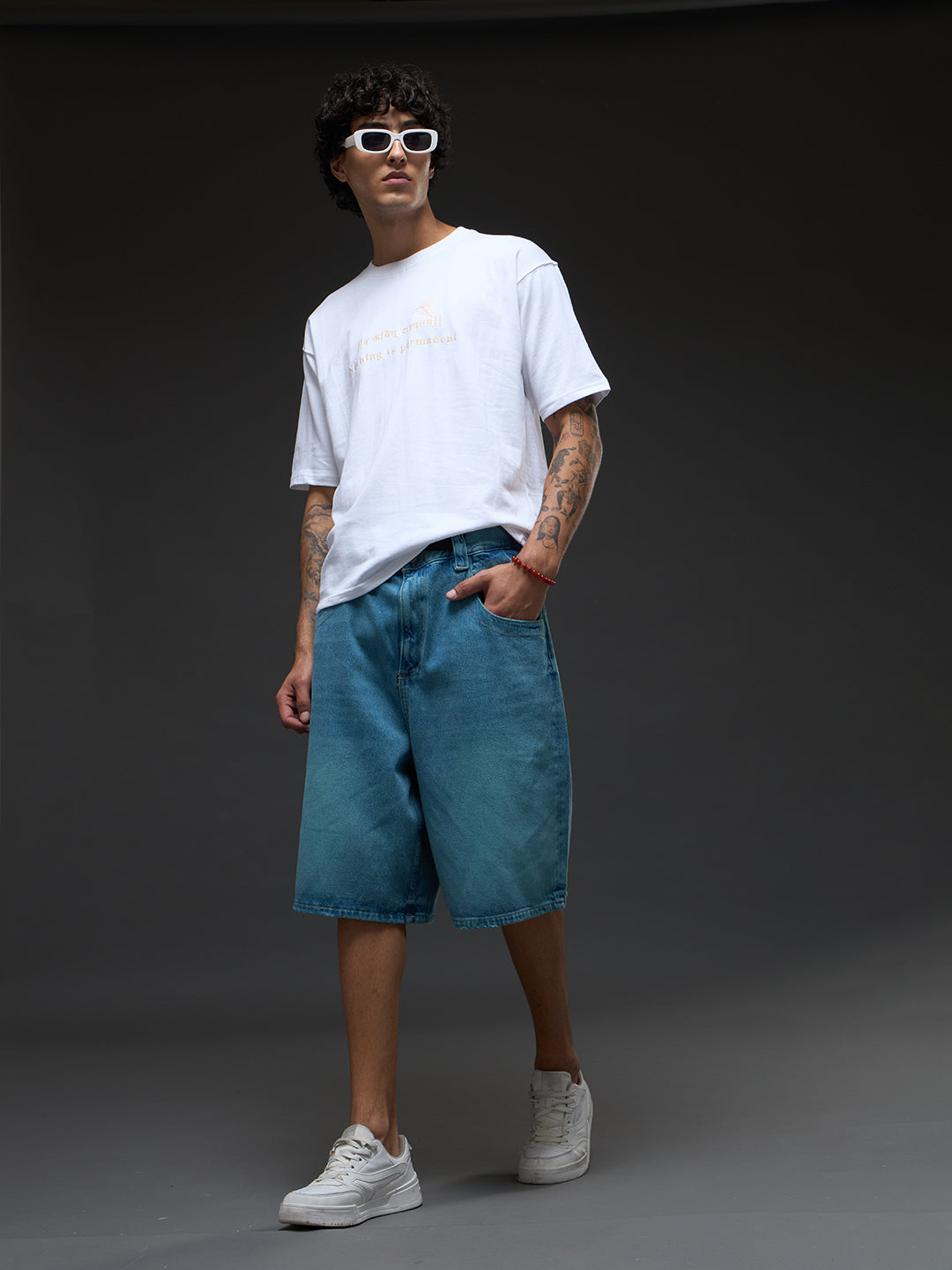 White and beige recycled oversized T-shirt by Rudrajap featuring a relaxed fit and eco-friendly fabric.
