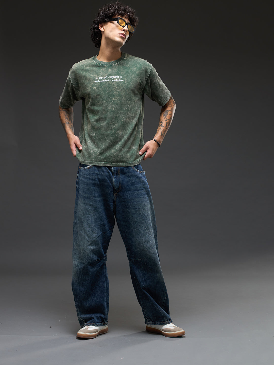 Moss green acid wash oversized T-shirt by Rudrajap with Sanskrit quote 'Yat Bhavo Tat Bhavati' displayed on front.