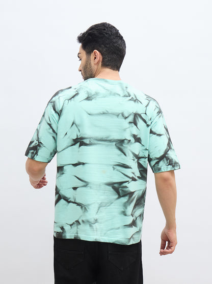 Mint Green Spray Print T-Shirt – "अंतः अस्ति प्रारंभः" (The End is the Beginning)