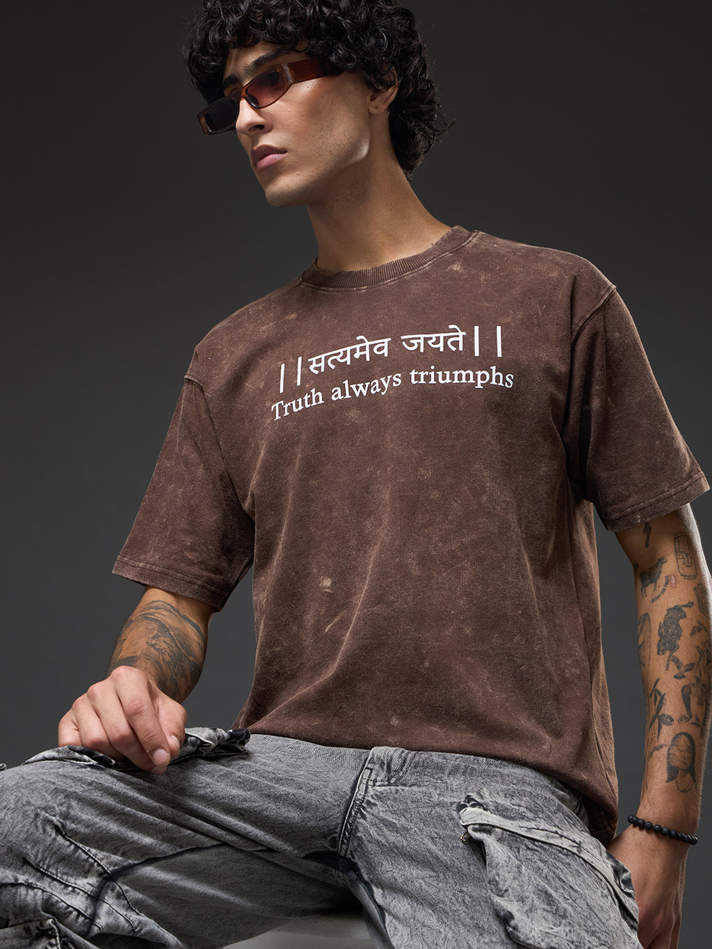 Oversized Rudrajap Truth Manifested Duo T-shirt pack in moss green and brown, featuring relaxed fit and bold graphic designs.