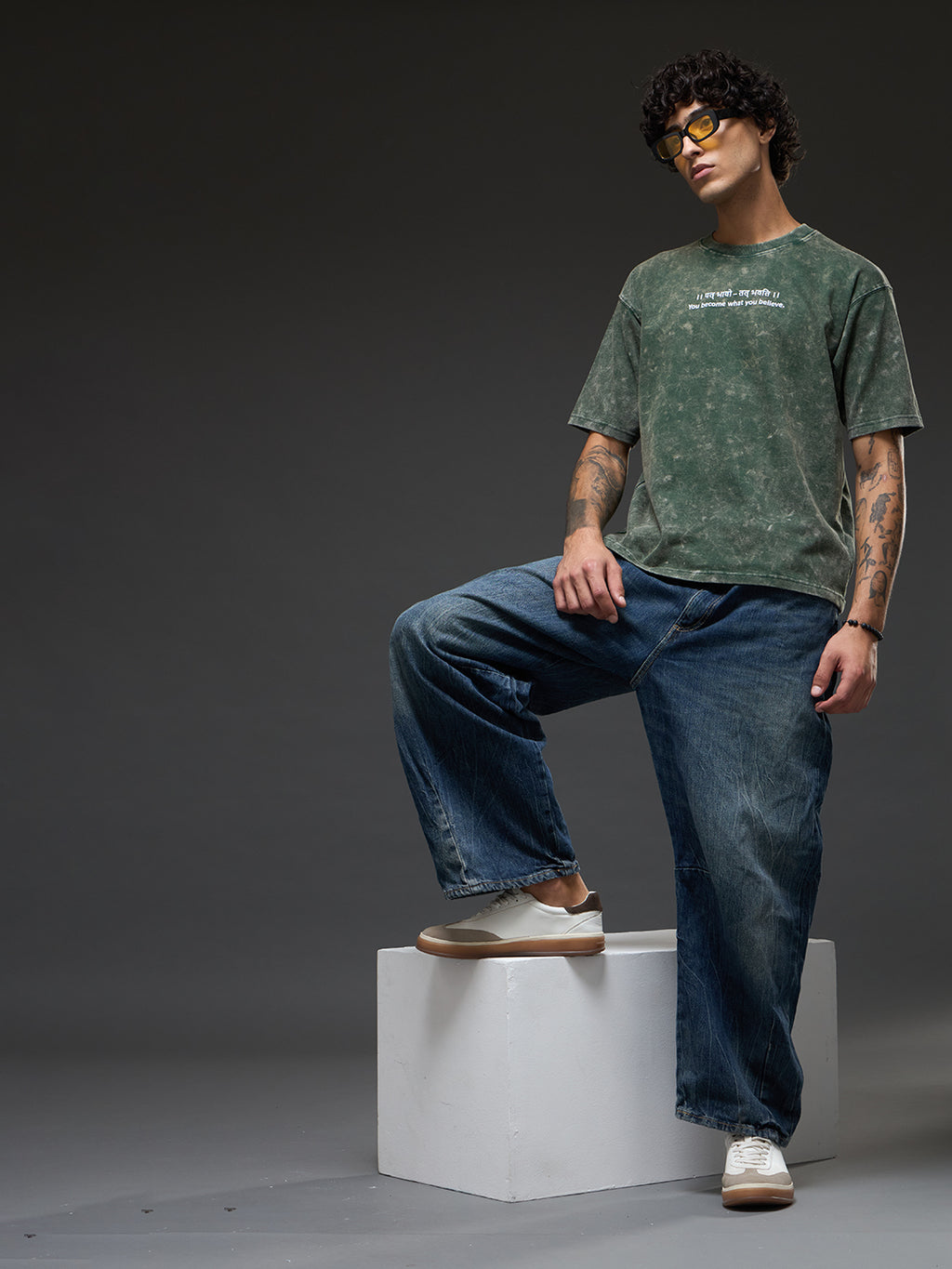 Moss green acid wash oversized T-shirt by Rudrajap with Sanskrit quote "Yat Bhavo Tat Bhavati" printed on front.