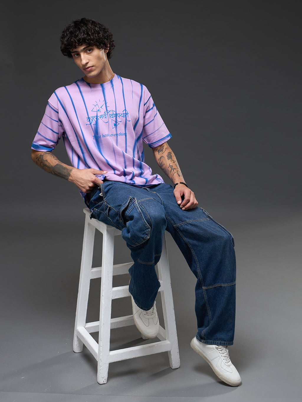 Lavender Spray & Puff Print Oversized Tee by Rudrajap featuring a relaxed fit and lavender graphic on soft fabric.