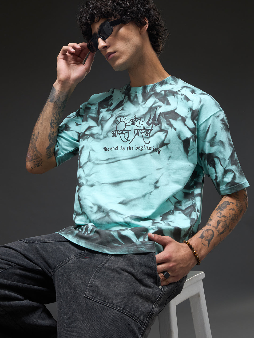 Mint green oversized tee with spray and puff print design by Rudrajap, featuring a relaxed fit and casual streetwear style.