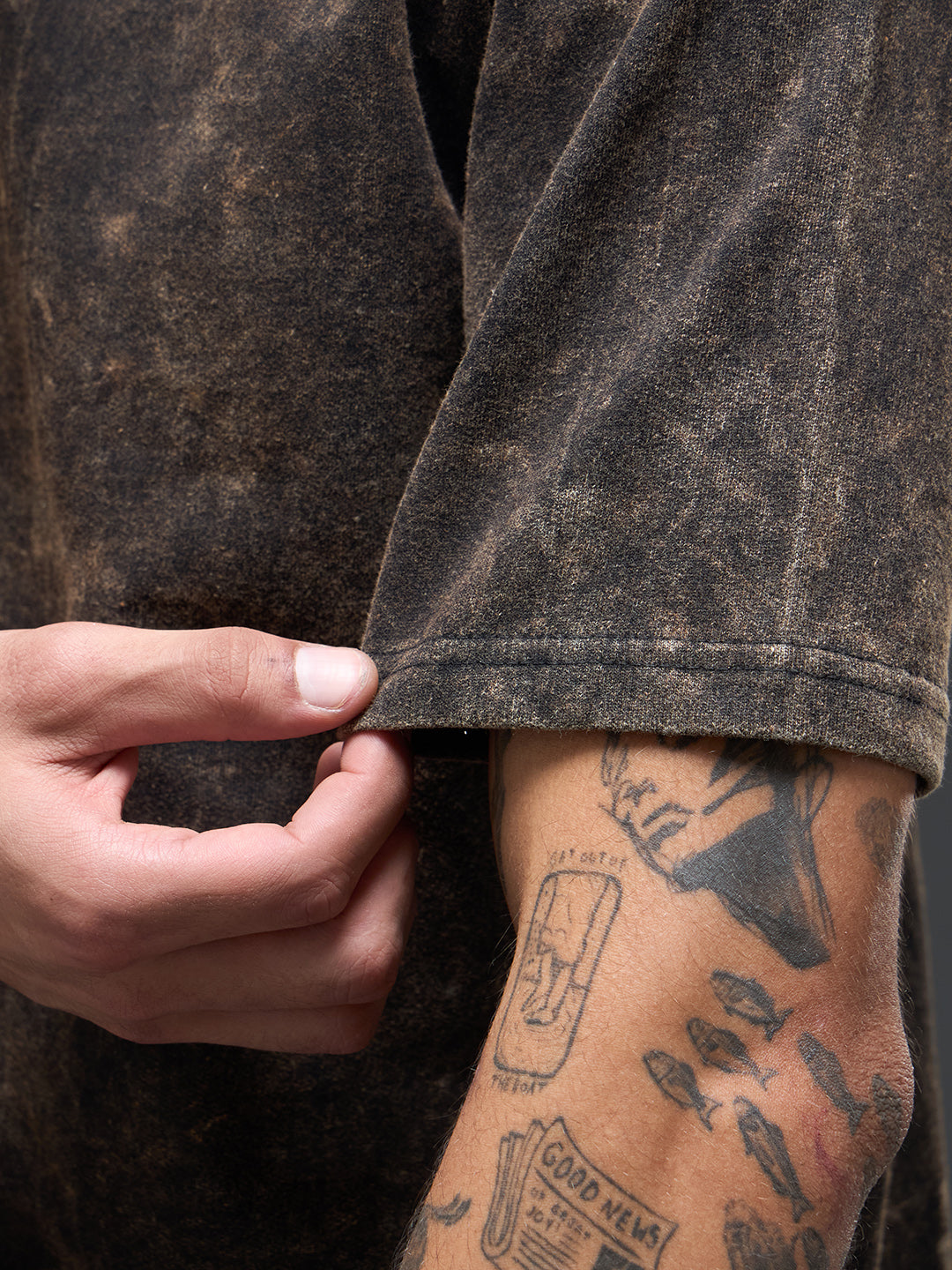 Black acid wash oversized T-shirt by Rudrajap featuring Sanskrit quote "।। यत् भावो – तत् भवति ।।" printed on the front.