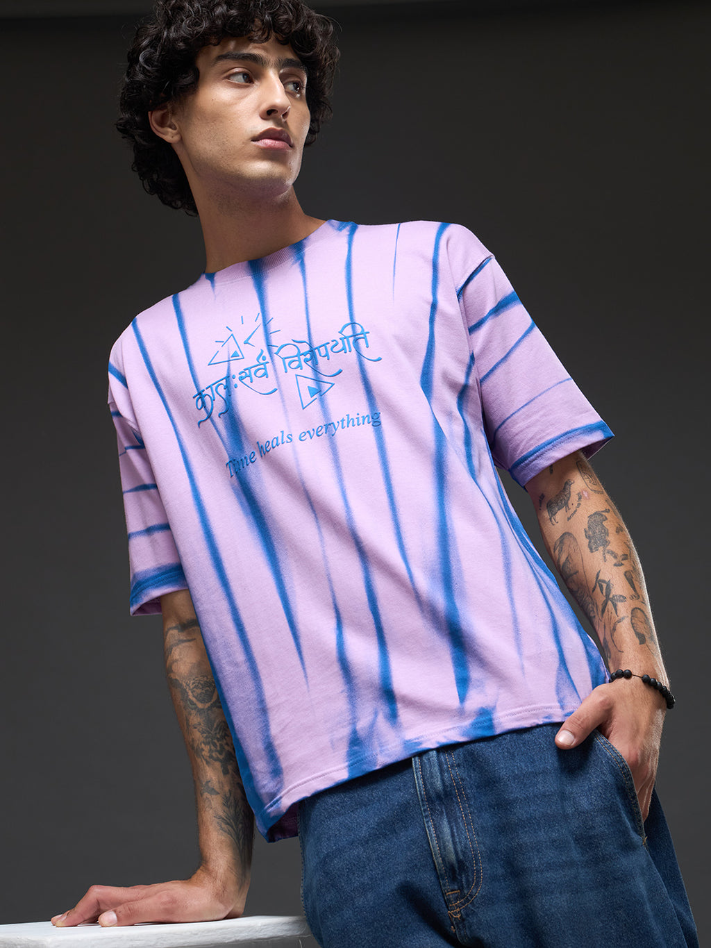 Lavender Spray & Puff Print Oversized T-shirt by Rudrajap with lavender graphic and relaxed fit, casual streetwear style.