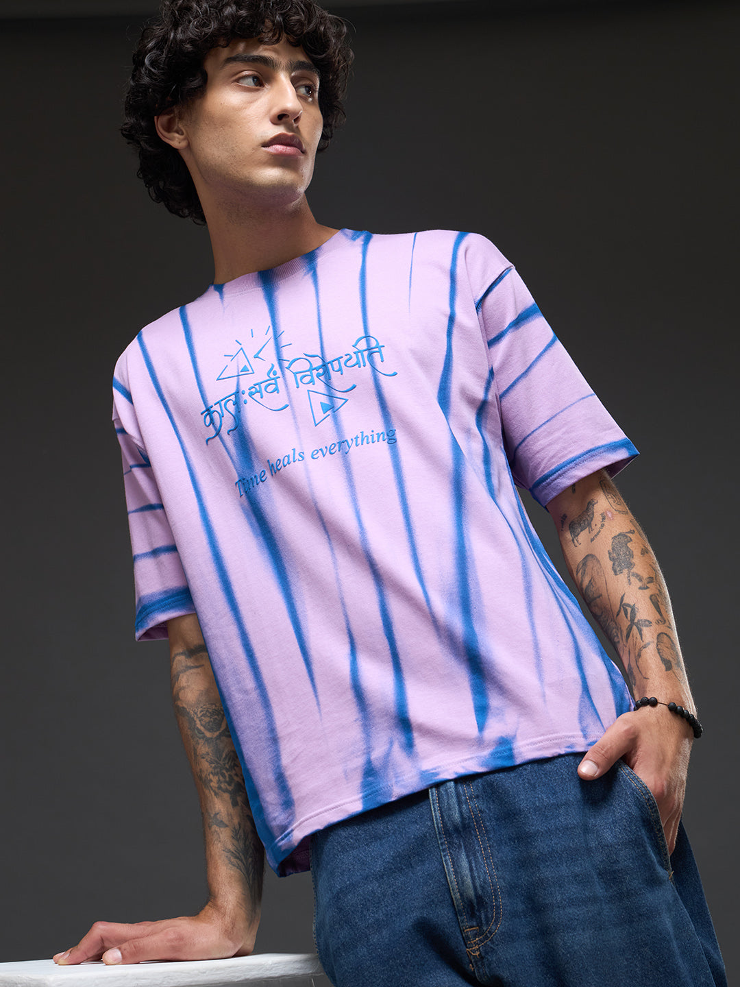 Lavender Spray & Puff Print Oversized T-shirt by Rudrajap with lavender graphic and relaxed fit, casual streetwear style.