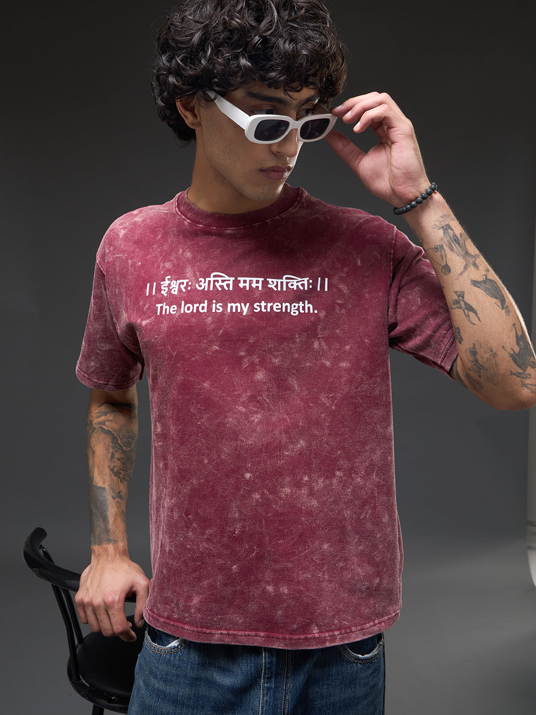 Brick red acid wash oversized T-shirt by Rudrajap with Sanskrit quote "Ishwarah Asti Mama Shaktih" in heavyweight cotton fabric