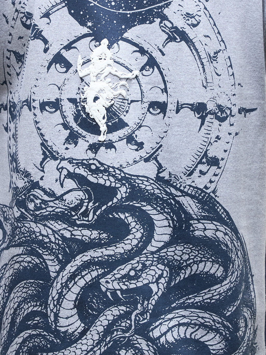 Rudrajap Govinda oversized T-shirt in soft fabric, featuring a relaxed fit and stylish design, displayed on a hanger.