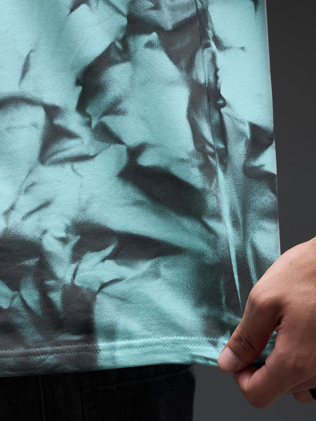 Mint green oversized tee with spray and puff print, by Rudrajap, featuring a relaxed fit and casual streetwear style.