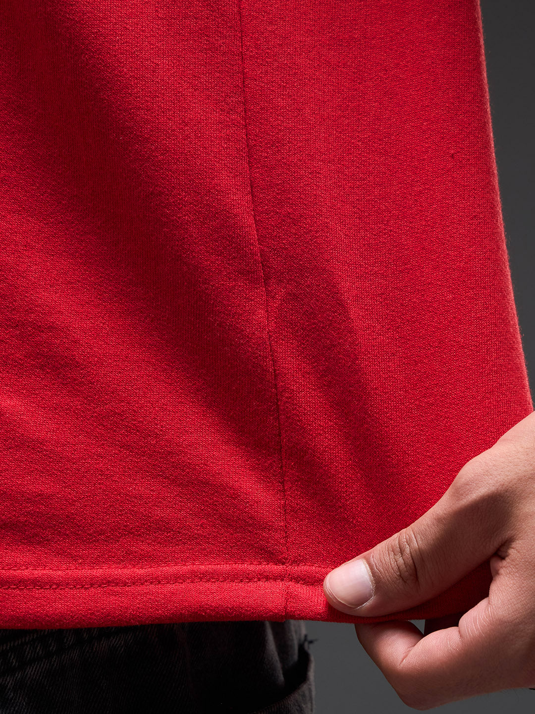 Red recycled oversized T-shirt by Rudrajap with premium embroidered "I Am Blessed" text, casual fit, and eco-friendly fabric.