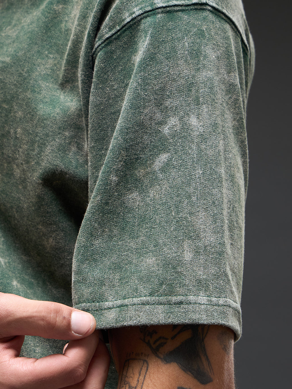 Moss green acid wash oversized T-shirt by Rudrajap with Sanskrit quote "Yat Bhavo Tat Bhavati" printed on front.